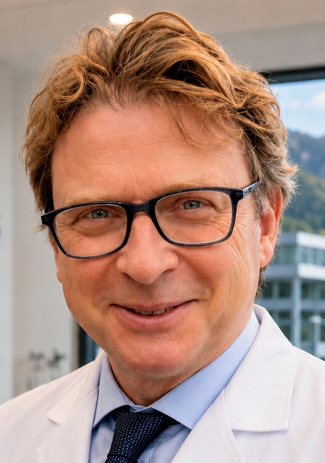 Dr._Dr._med._Eugen_Mann_design.Chefarzt_Radiologie_KSGL.png